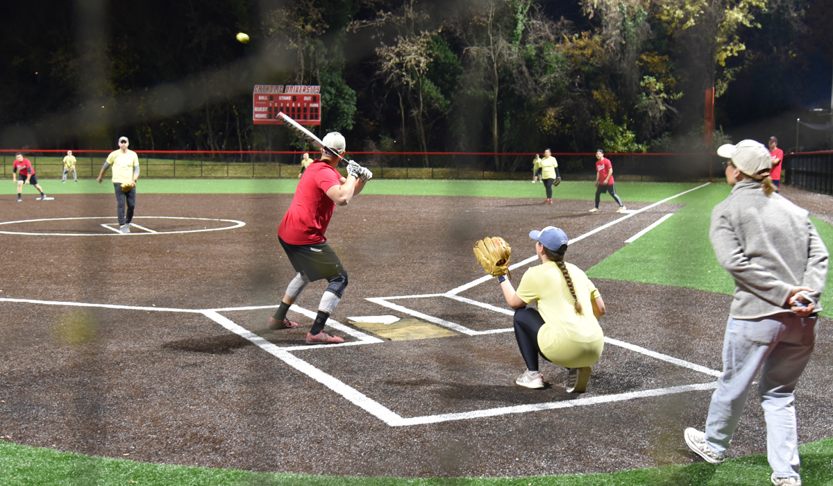 Softball game with 3Ls up at the plate